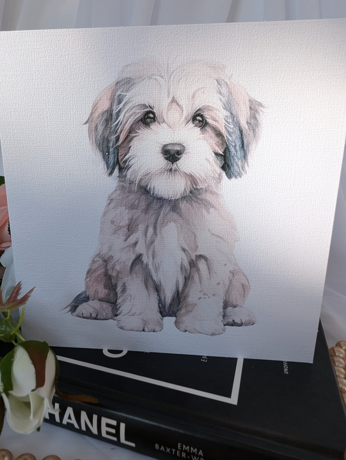 White linen effect 300gsm greeting card, printed with a watercolour style image of a cute Havanese dog.