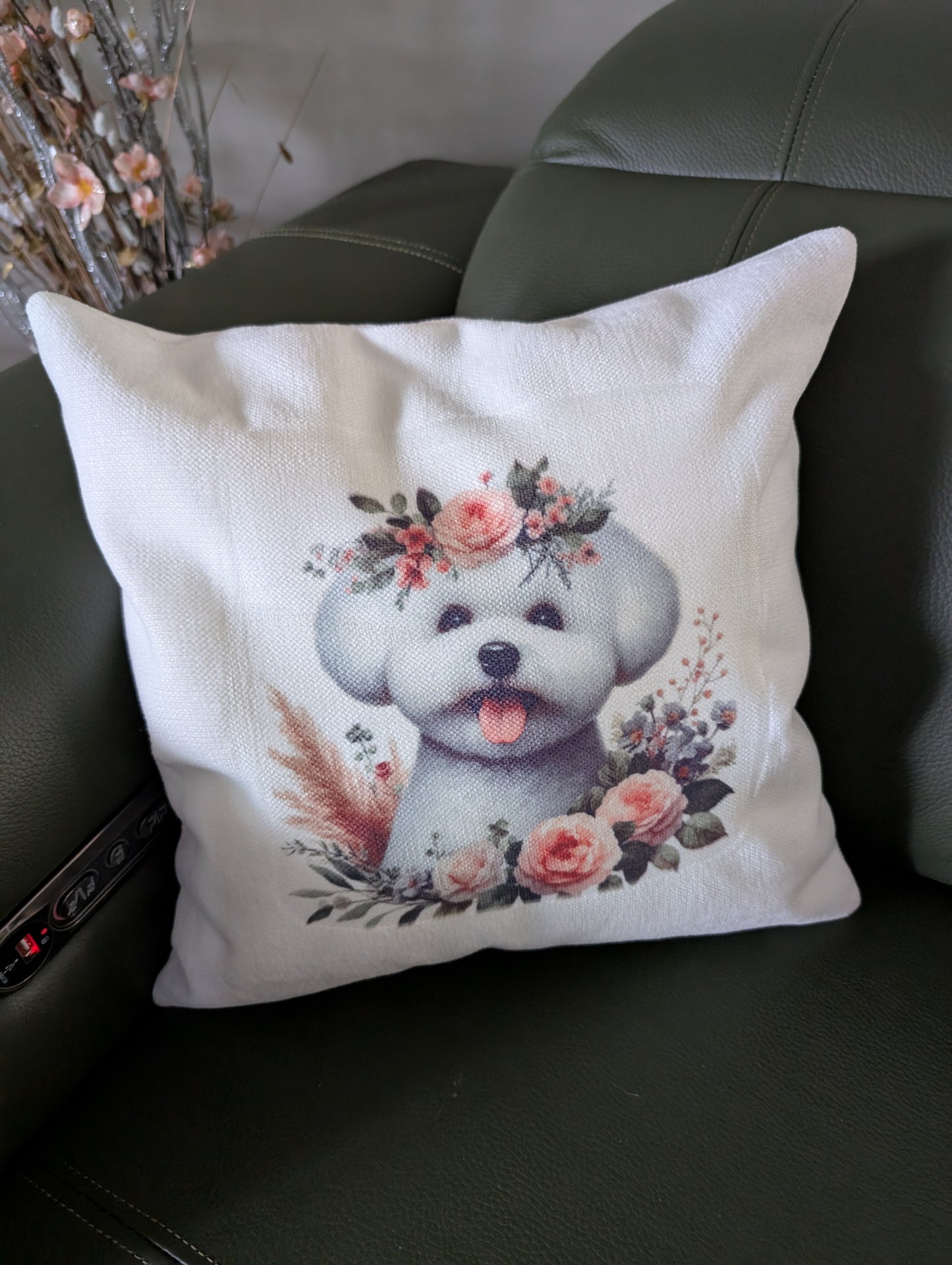 Bichon Frise linen effect dog cushion on a green leather couch