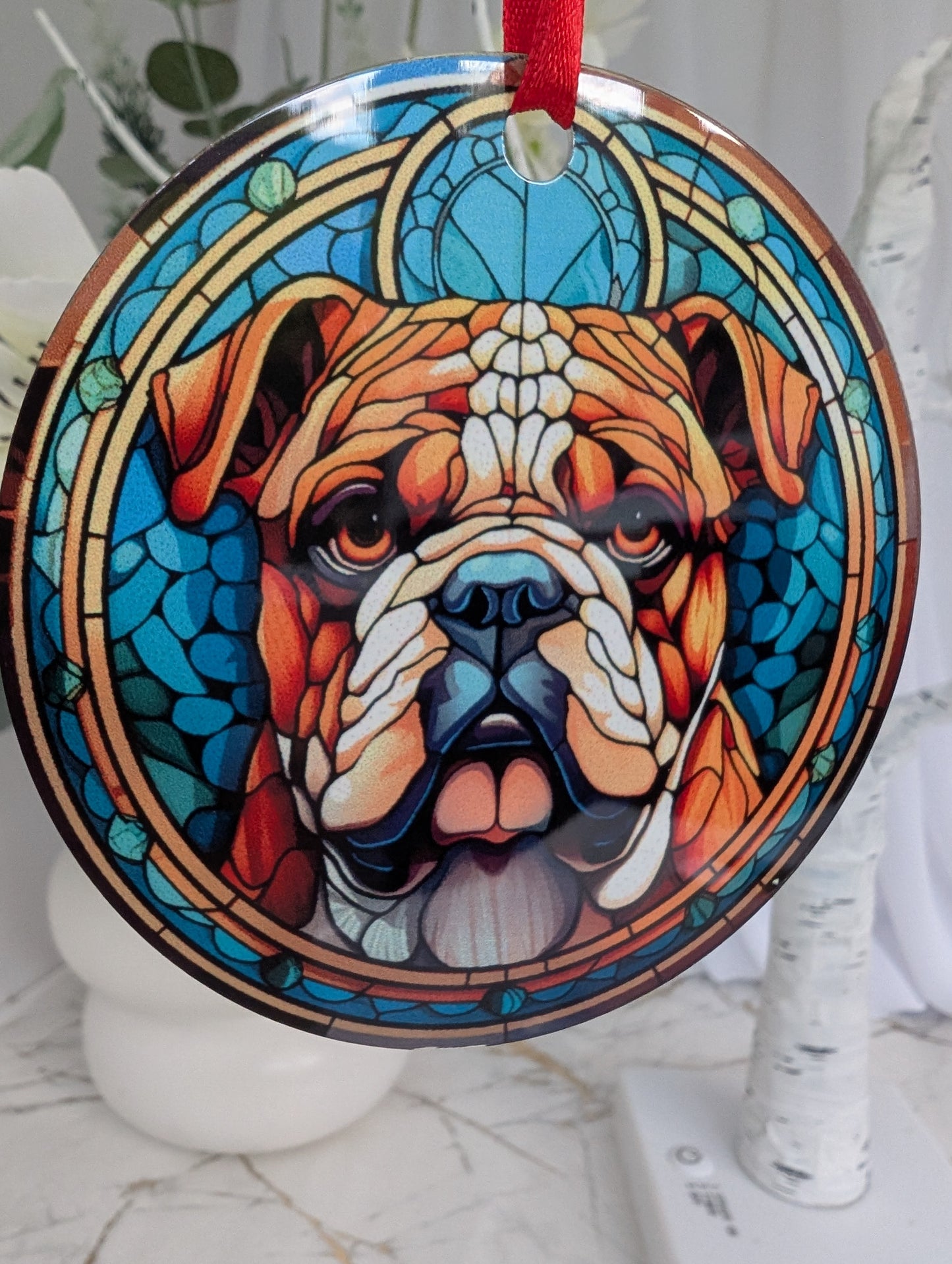 front close up of Bulldog hanging ornament in stained glass style, featuring a British Bulldog on a blue background