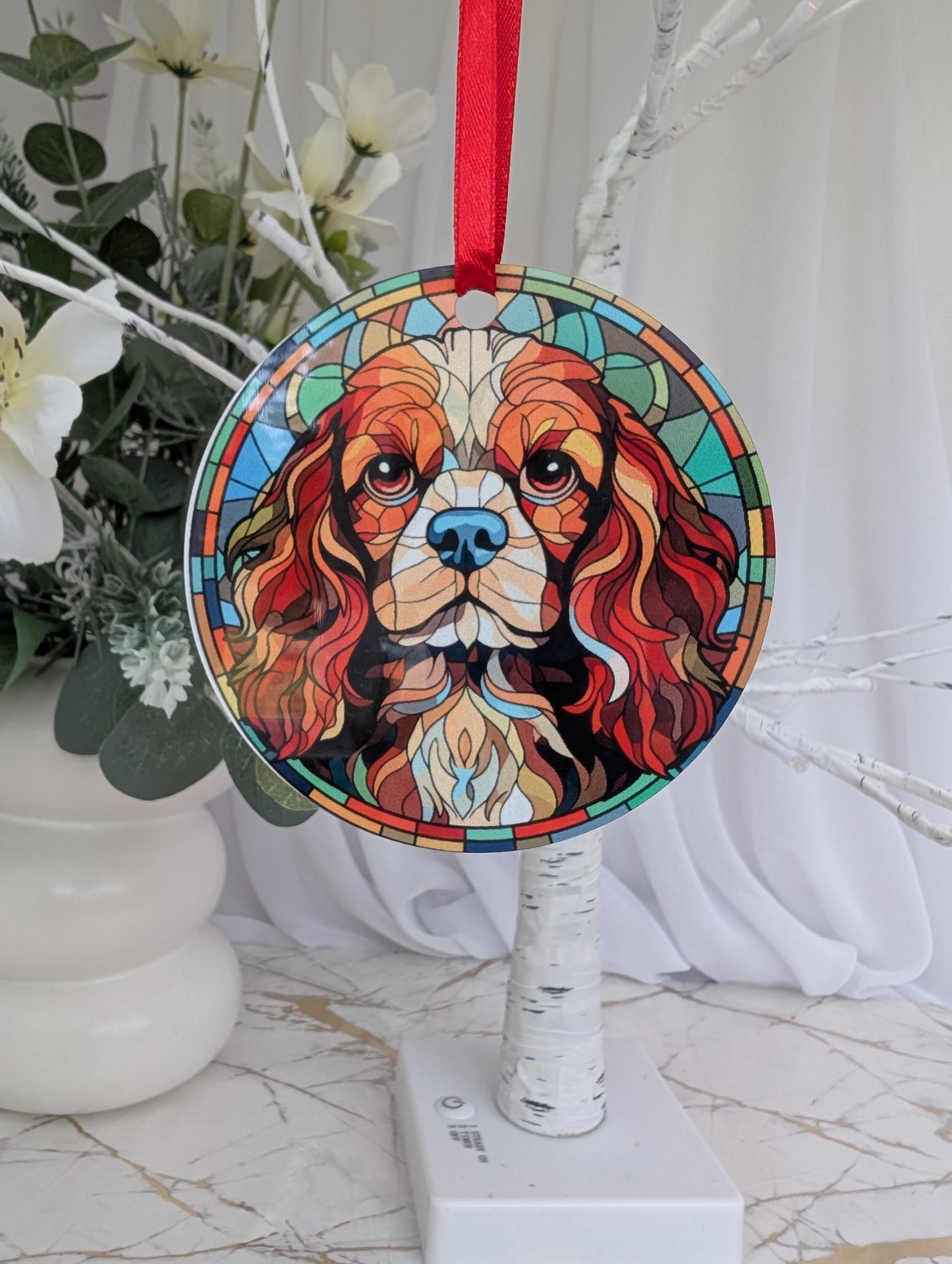 Cavalier King Charles hanging ornament featuring a stunning stained glass style design. Printed double-sided on lightweight, durable aluminium