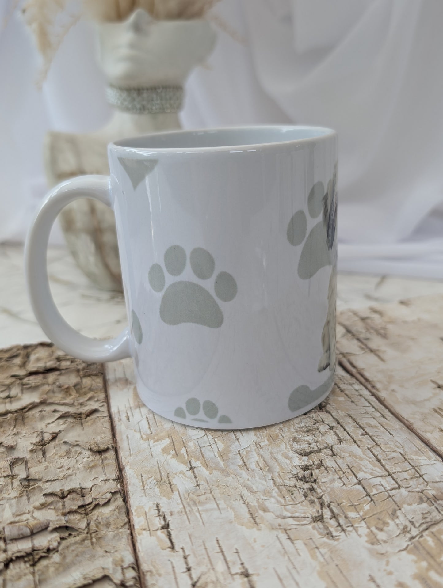 right side view of Ceramic Havanese Dog mug with heart , paw and bone background in grey