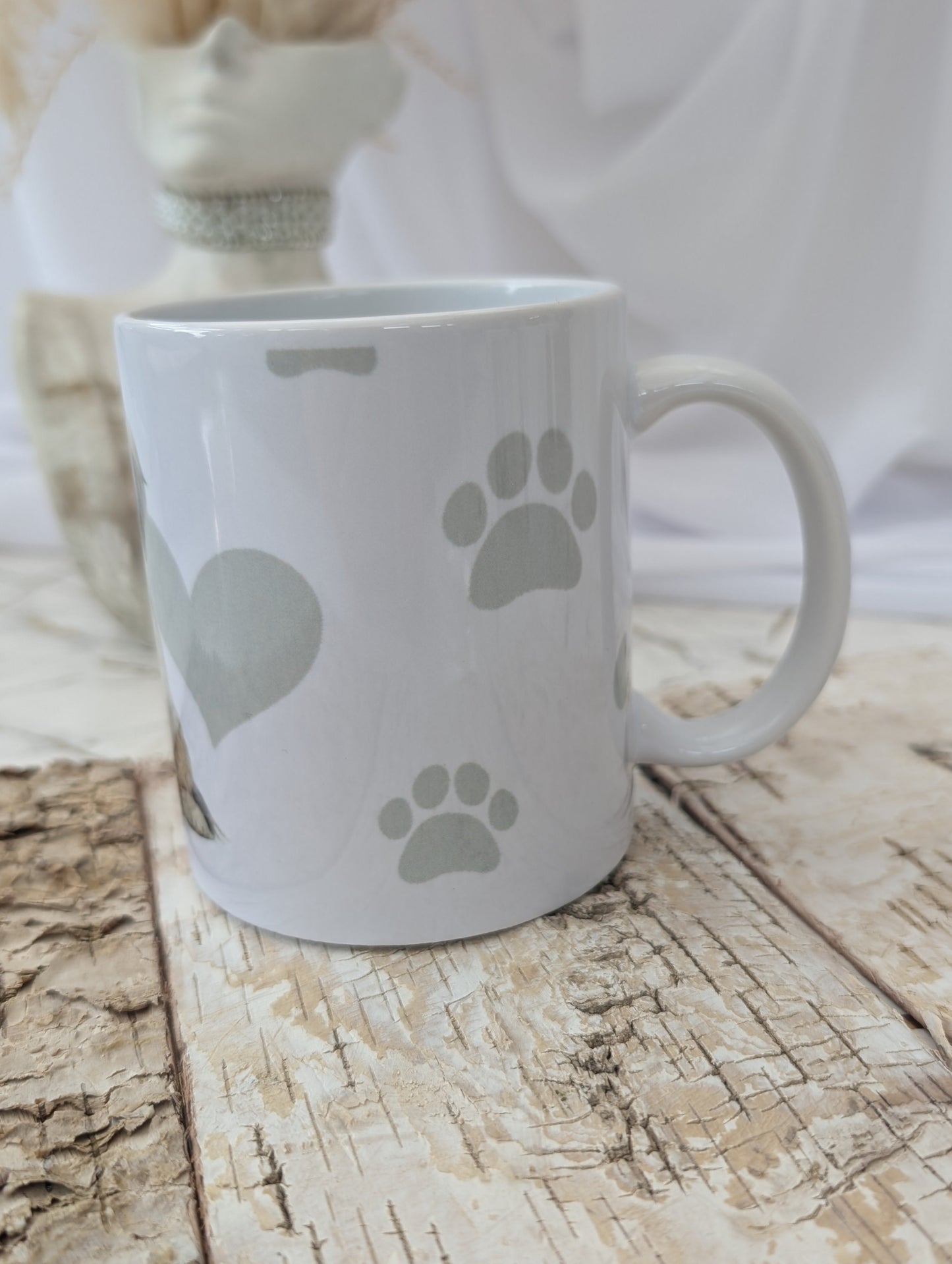 left side view of Ceramic Havanese Dog mug with heart , paw and bone background in grey