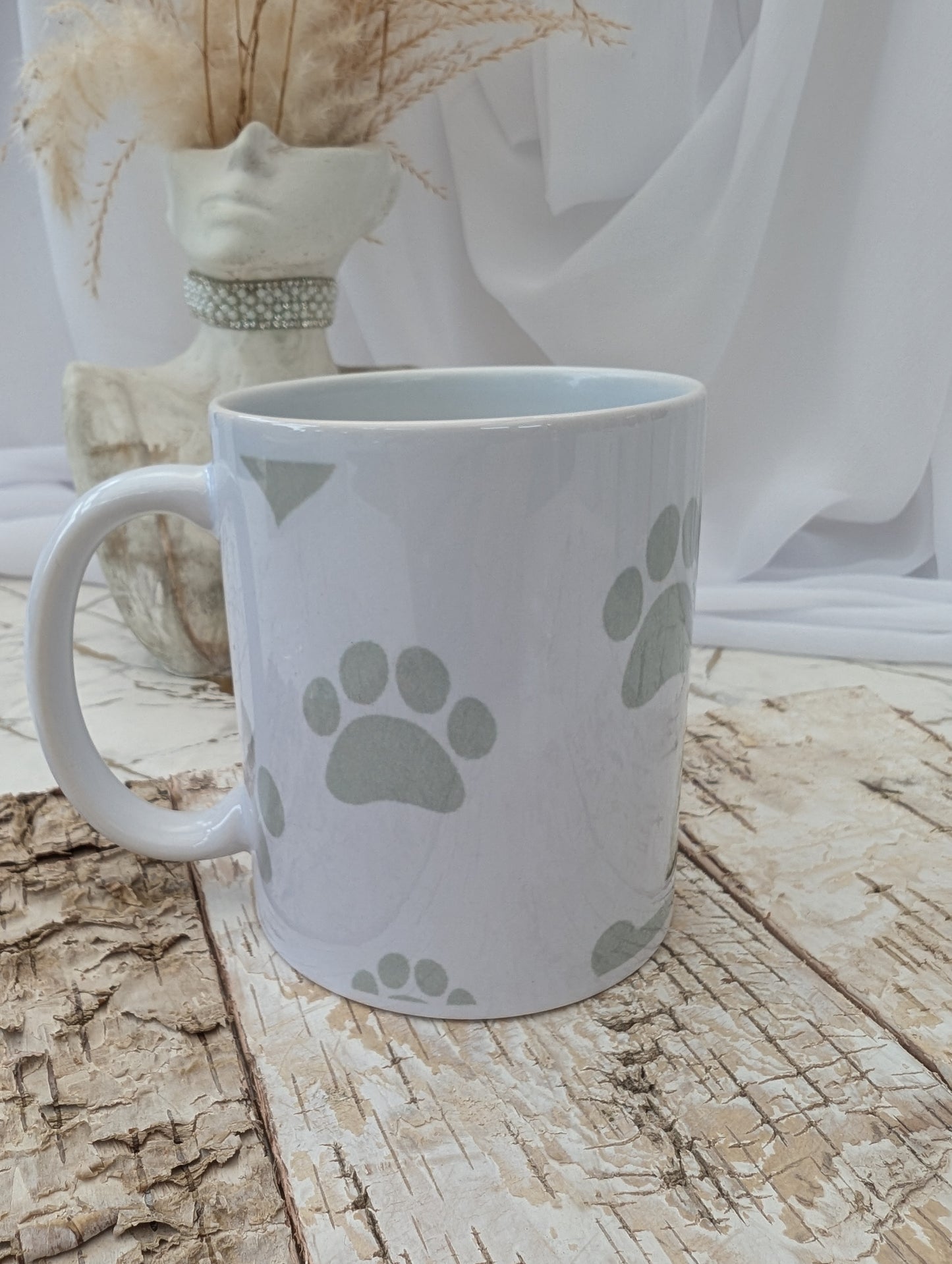 Right side view of Western Highland Terrier mug with grey paws, heart and bones background
