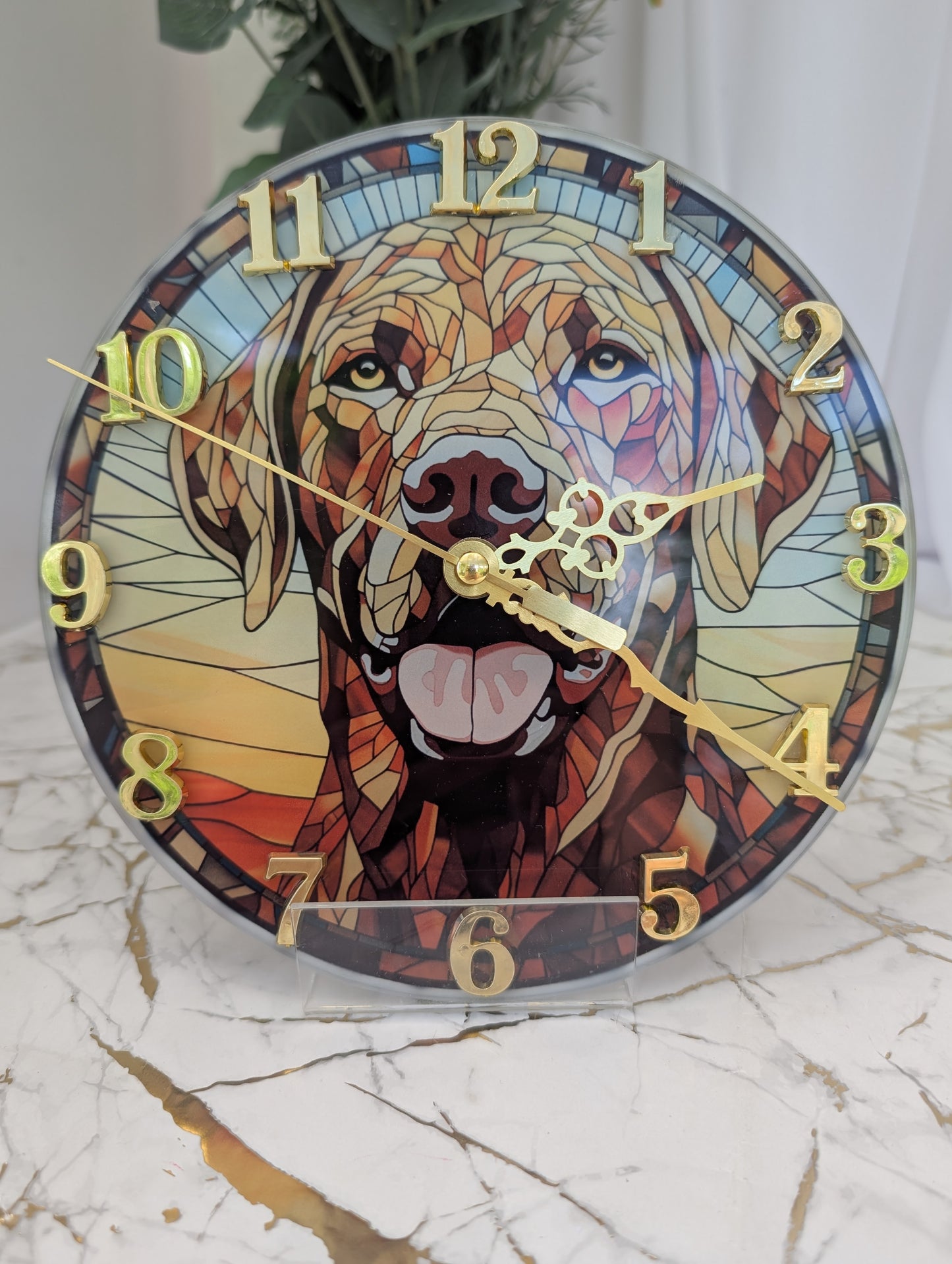 close up of 20cm diameter, round, stained glass style, Labrador wall clock with gold numbers and clock hands