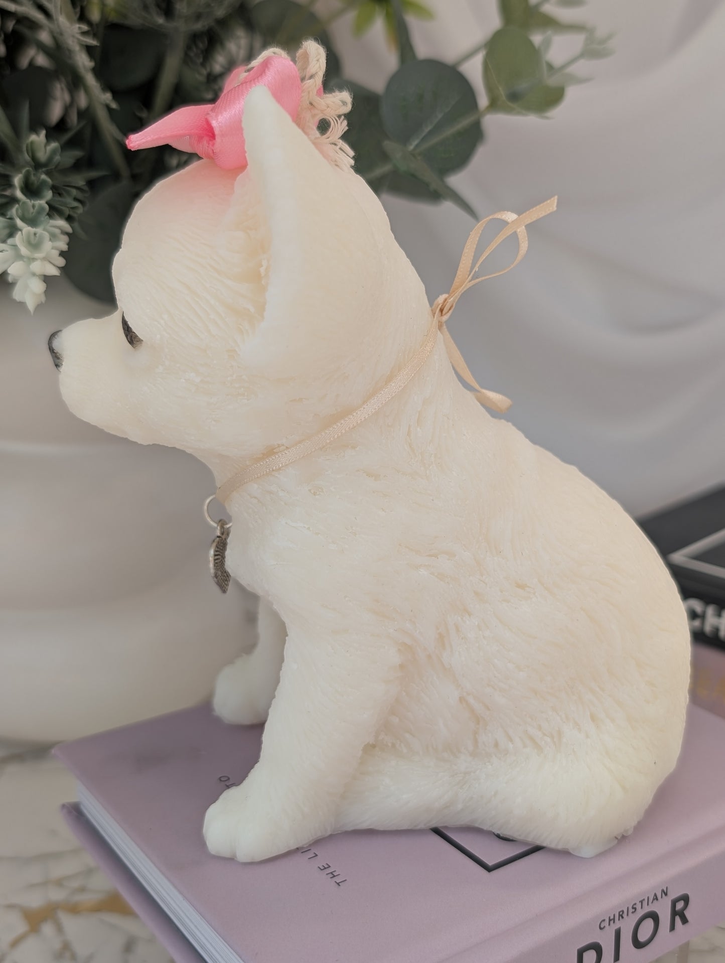 Left-side profile of handcrafted Chihuahua candle with detailed fur texture, perked ears, and visible charm accents