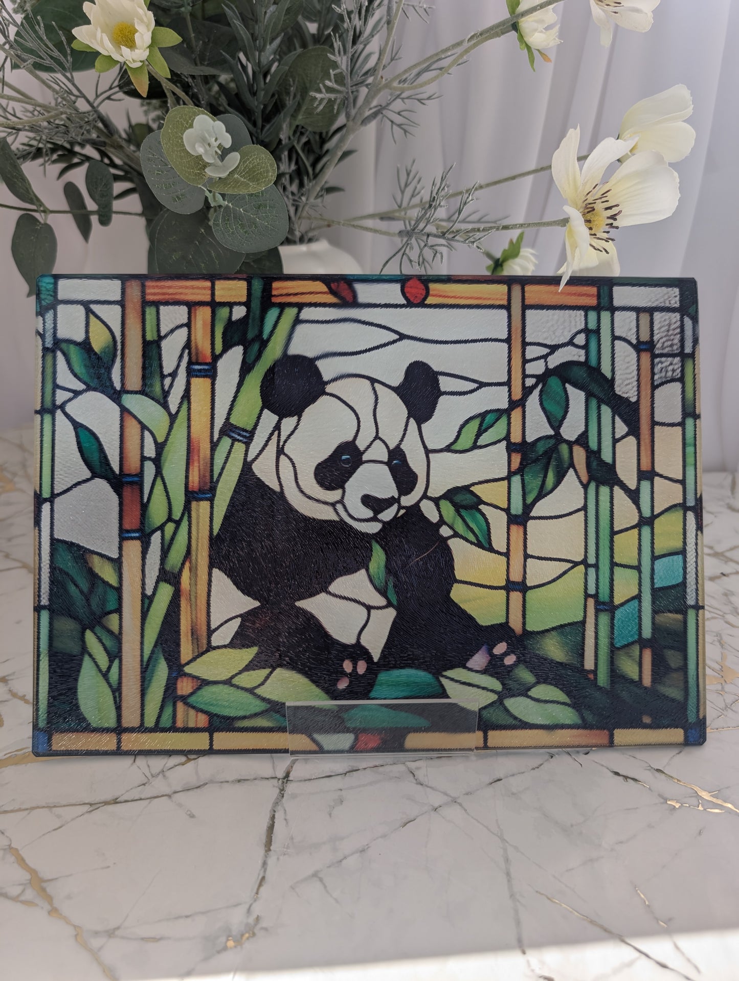 Colourful Panda sitting in Bamboo - rectangular chopping board in stained glass style