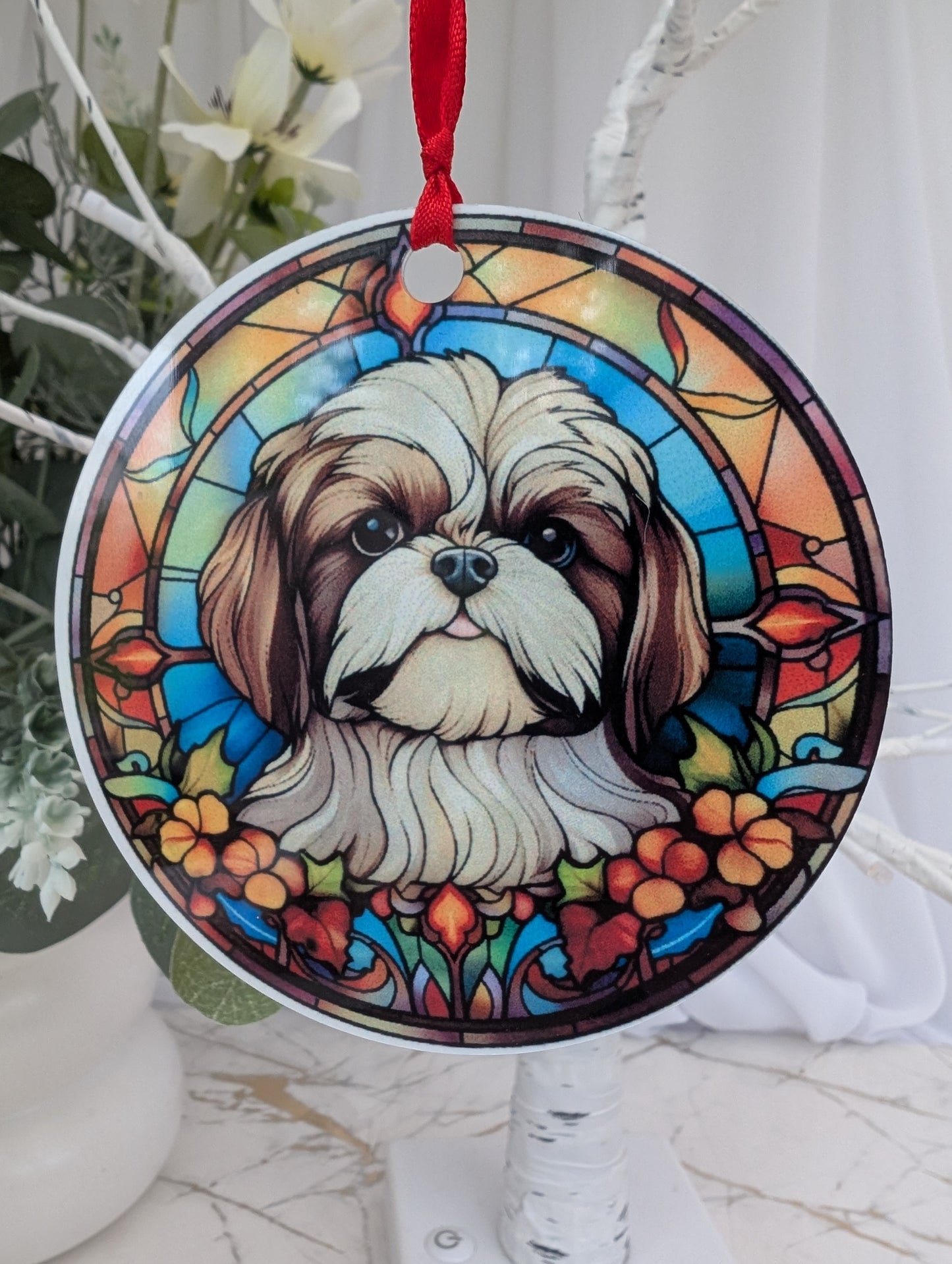 close up of 9cm round aluminium stained glass style schih-tzu hanging ornament