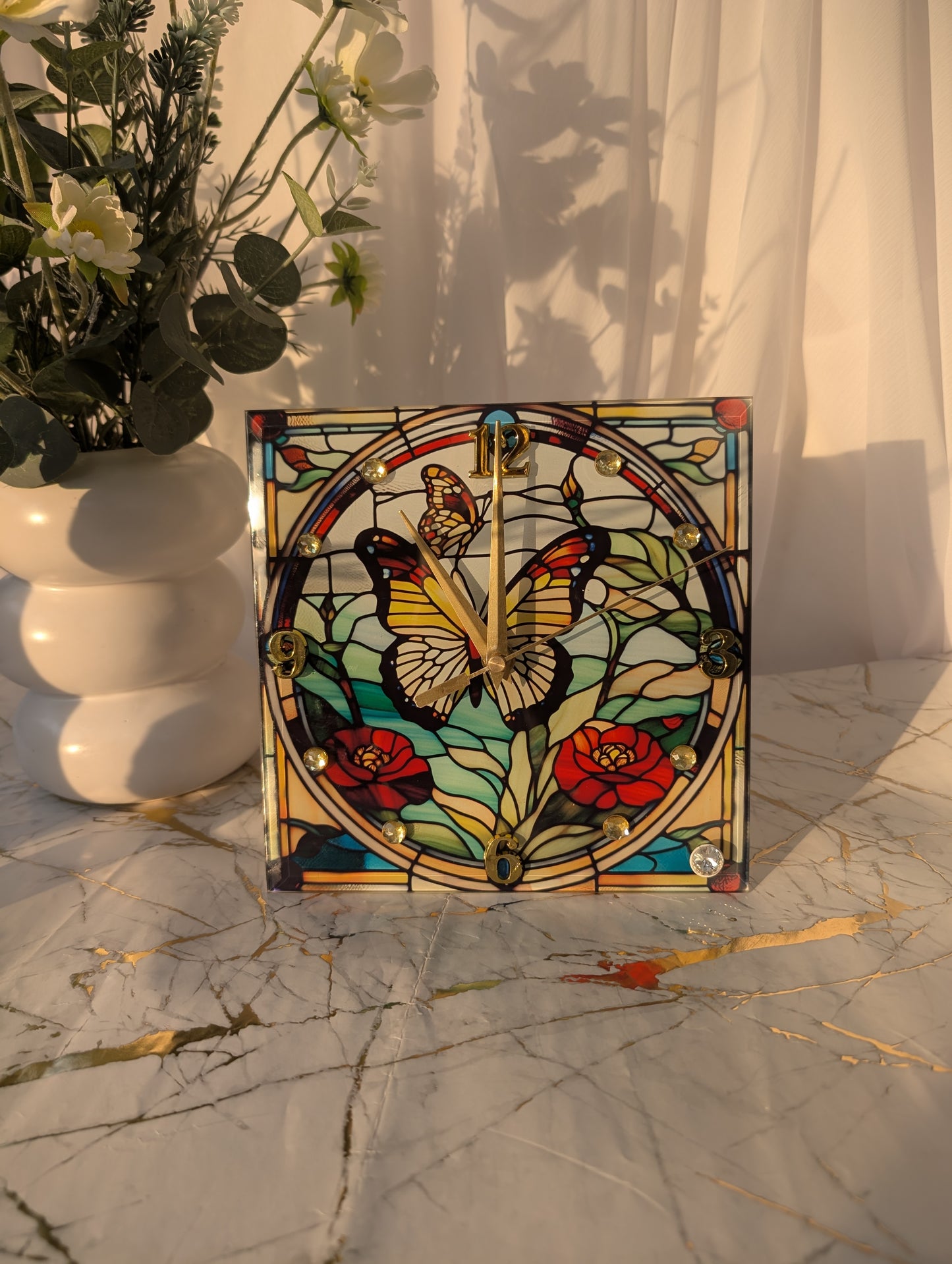 20cm freestanding butterfly clock showing stained glass-style detailing and intricate wing patterns