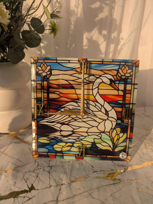 Freestanding multi-colour stained glass-style swan desk clock with roman numerals and elegant nature-inspired design.