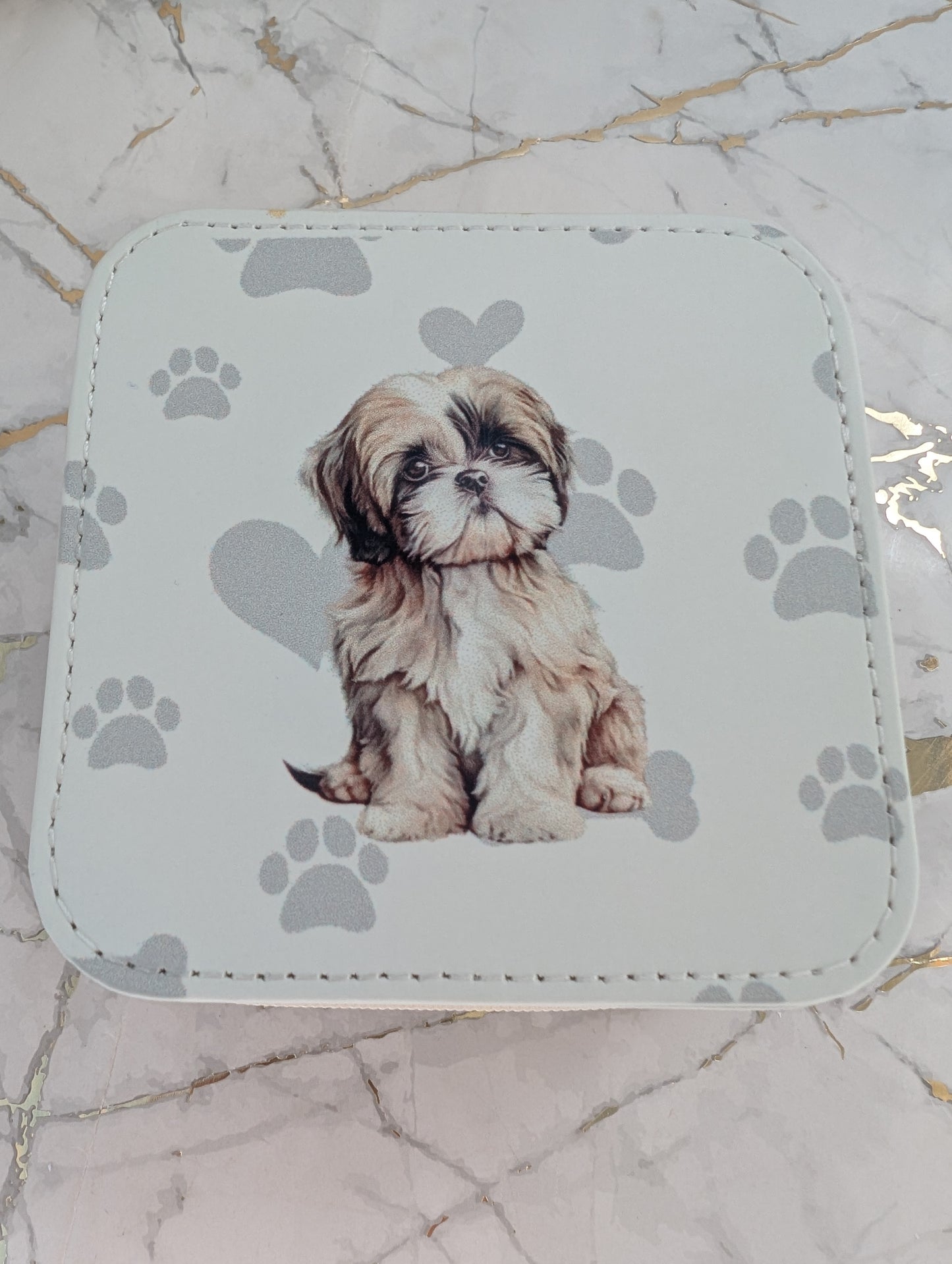 close up of Travel Jewellery Box - Cream faux leather with cute Shih Tzu design with grey heart and pawprint background