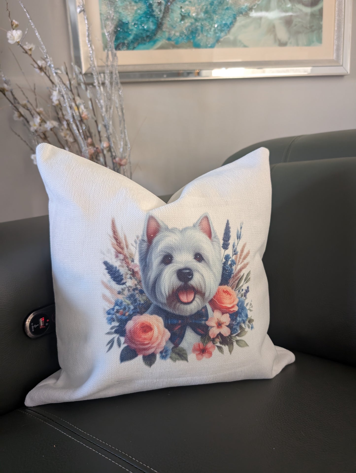 Western Highland terrier with flowers dog cushion on green leather couch