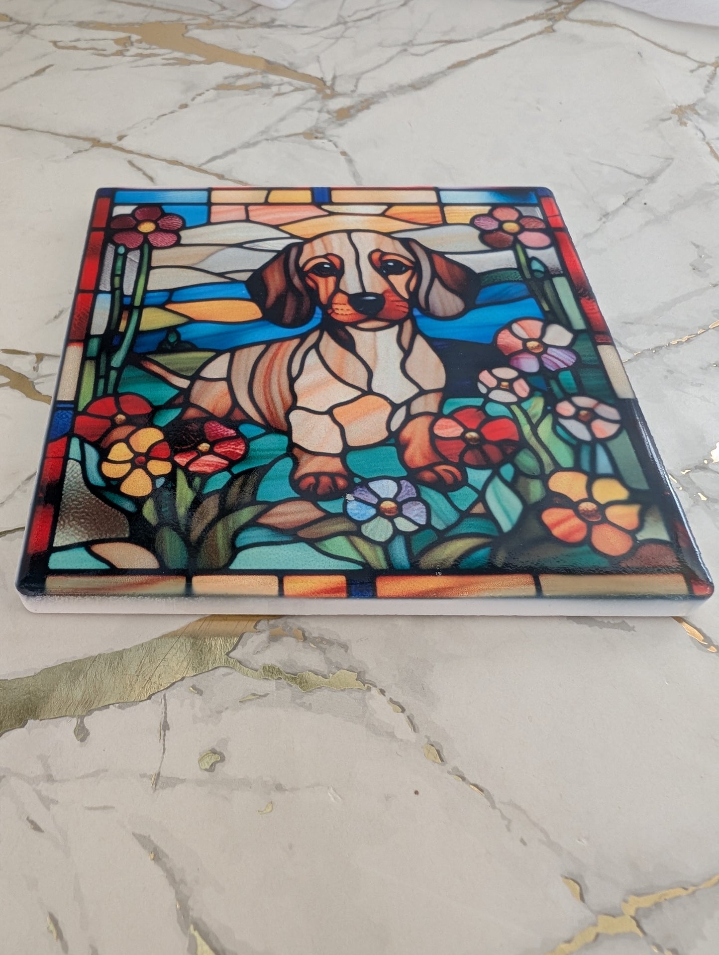close up of colourful stained glass style ceramic Dachshund coaster, gift for dachshund lovers, dog mums and dads