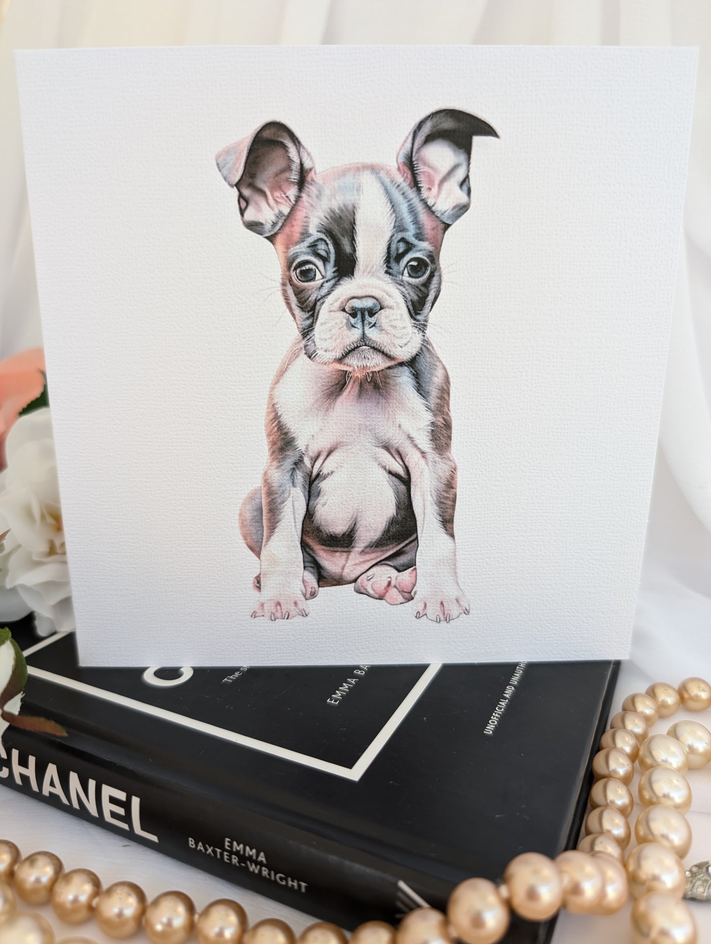 close up view of 6x6inch Boston Terrier puppy notecard on white linen effect 300gsm quality card.