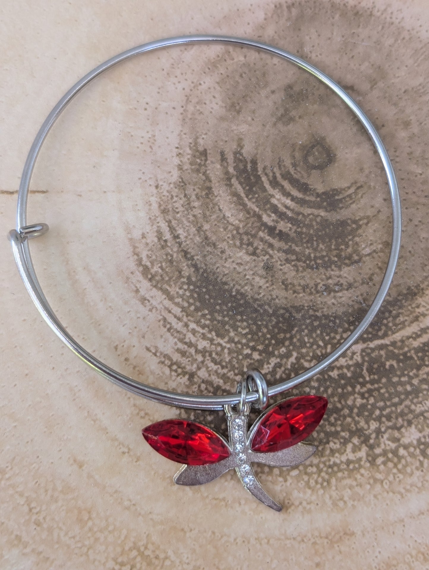 stainless steel expandable bracelet with red stone dragonfly charm