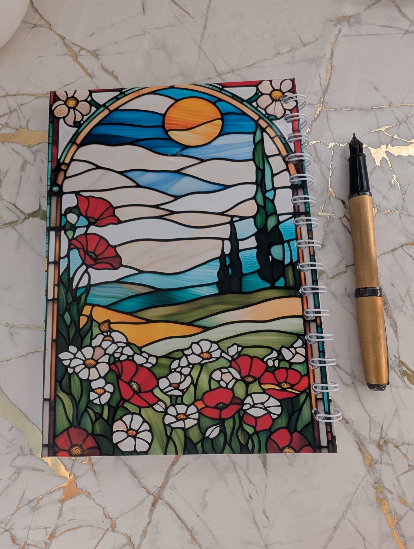 Top view of back cover of stained glass design kitten notebook
