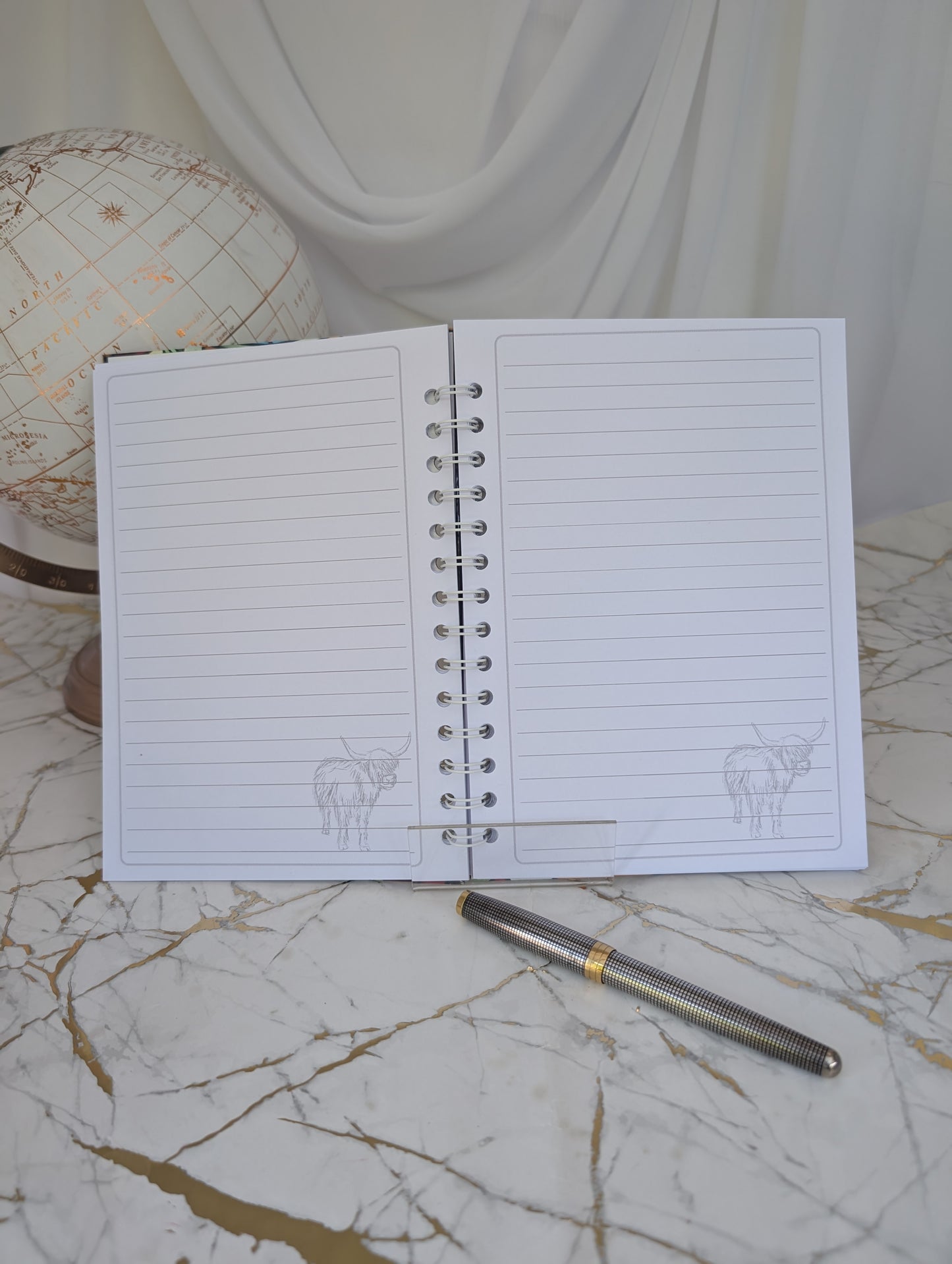 inside pages of highland cow notebook