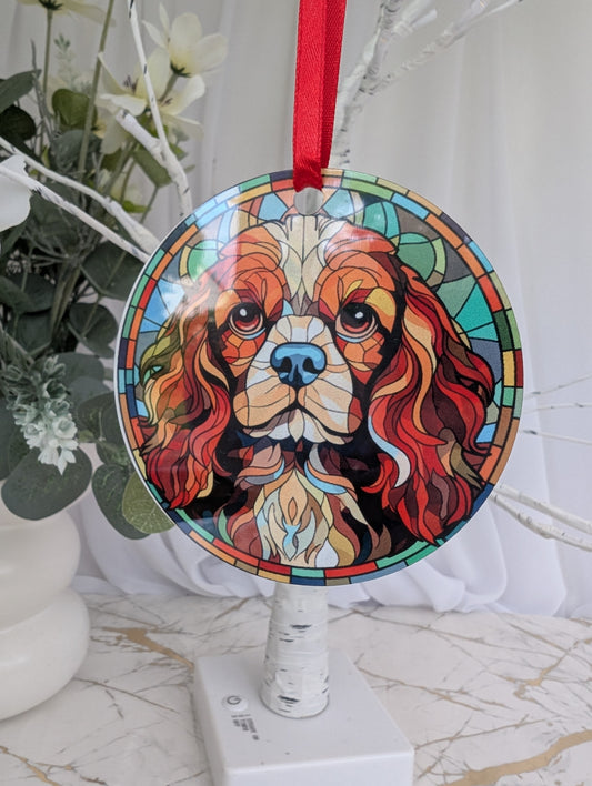 Cavalier King Charles Spaniel hanging ornament - stained glass style in blues, with vase and flowers in the background