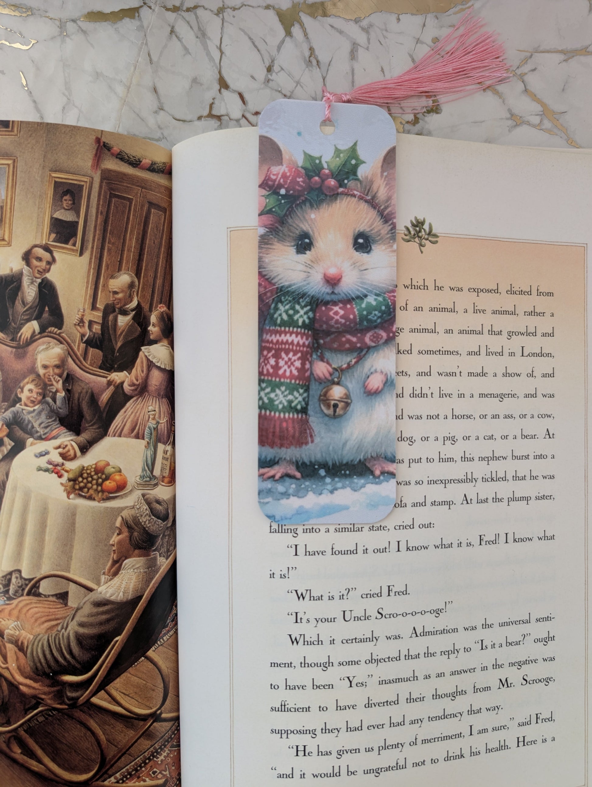 Christmas mouse-themed bookmark on a book with decorative elements