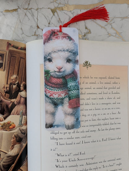 Bookmark with a cute Christmas lamb design on an open book