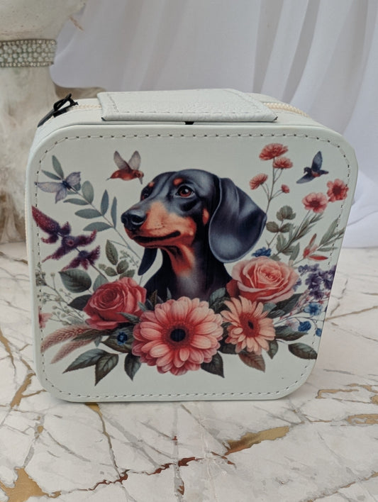 Cream faux leather travel jewellery box with dachshund and flower image