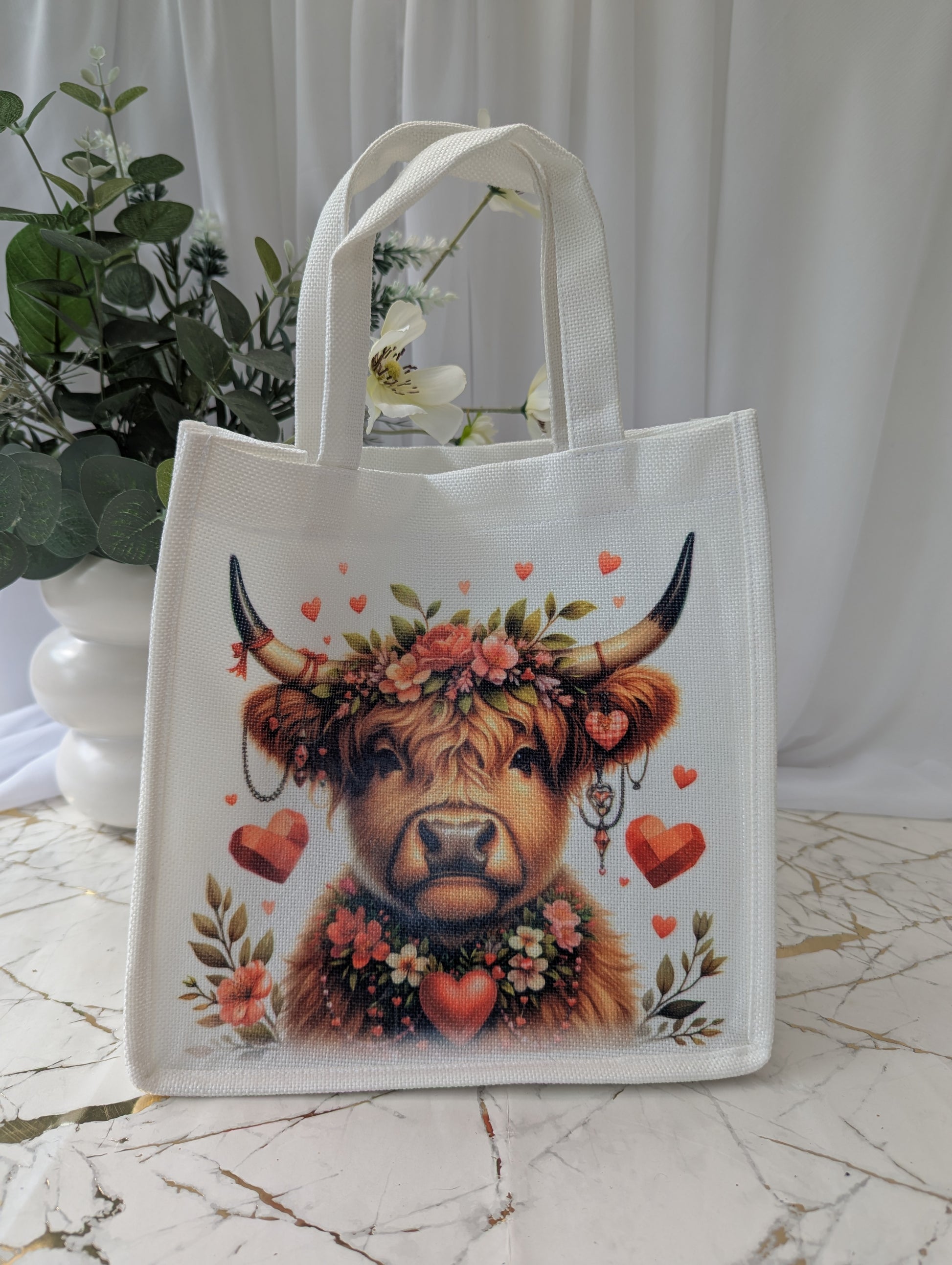 Highland cow gifts - tote bag with highland cow adorned with flowers and hearts