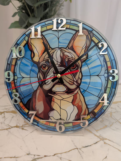 close up detail of 20cm round French Bulldog Wall clock in blue themed stained glass effect design, silver numerals and black clock hands