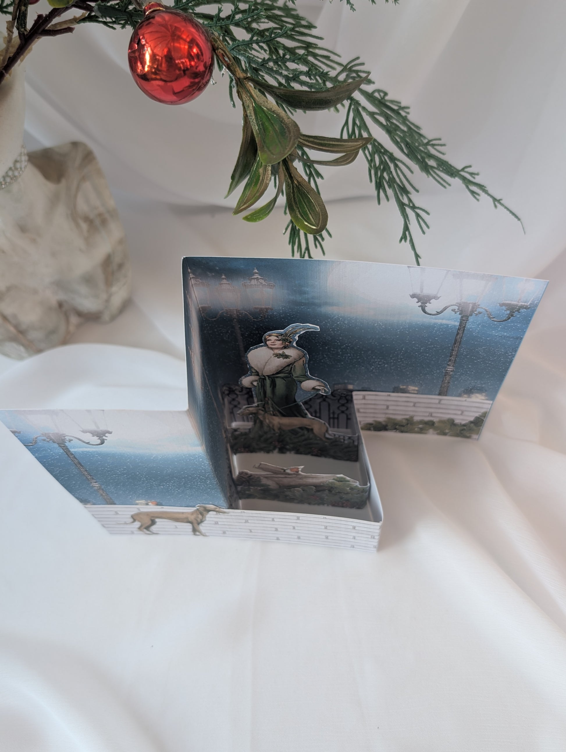 Top view of pop up Christmas card - Art deco with greyhound