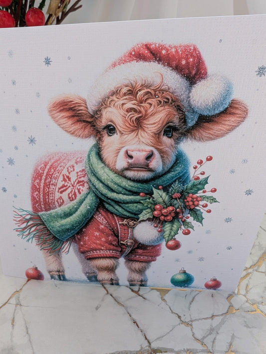 Highland Cow Christmas Card - dressed in Santa hat red fairisle jumper with holly and scarf