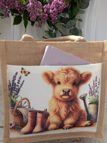 Highland Cow Tote bag with a cute cow illustration and lavender flowers. showing front pocket