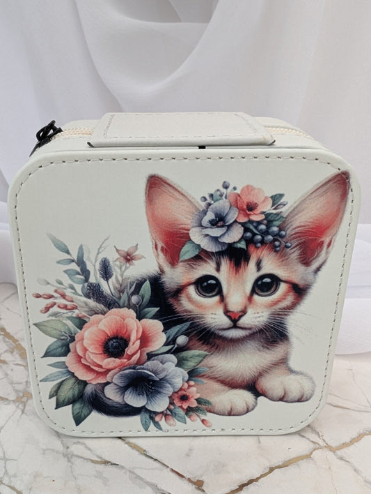 Cat Gift - travel jewellery box with a design of a kitten and flowers on a marble surface.