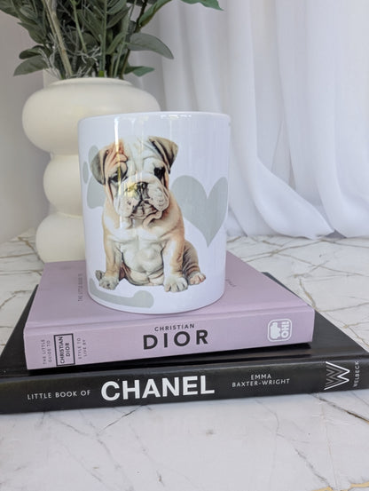 White ceramic 11oz Bulldog mug, watercolour style image on a background of pale grey paws, hearts and bones