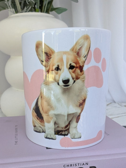 White ceramic Welsh Corgi mug with pink bones, paws and heart background