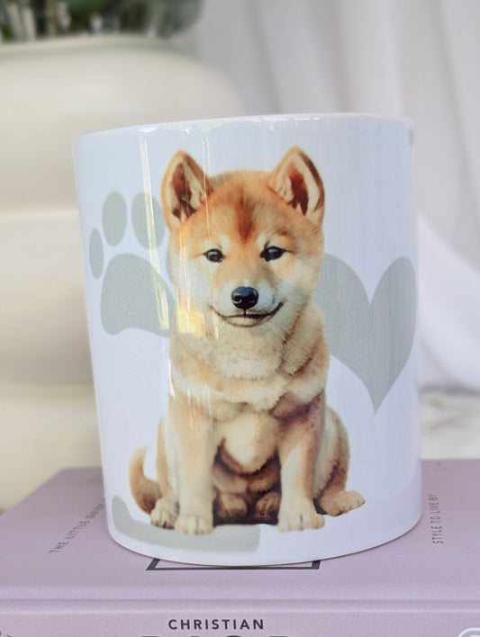 Shiba Inu mug, watercolour style image on white ceramic mug with background of pale grey hearts, paws and bones