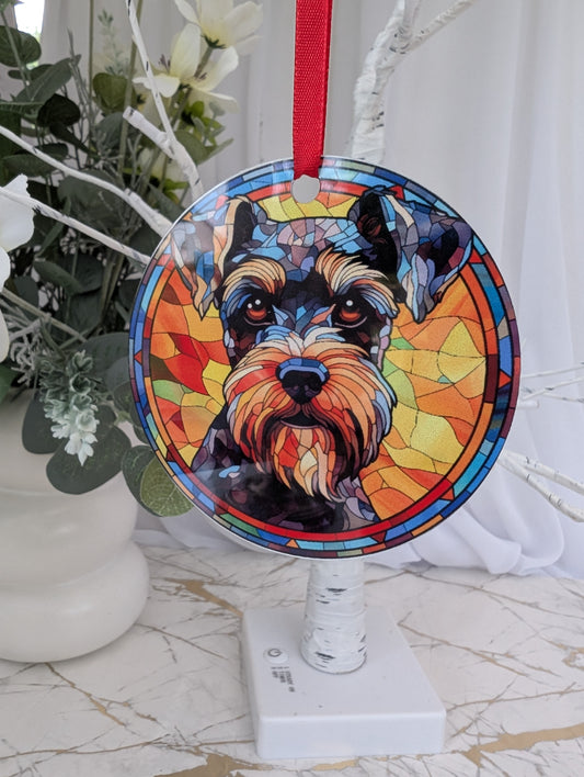 Lightweight aluminium, multicolour, 9cm round Schauzer dog hanging ornament in stained glass style.  Printed on both sides.