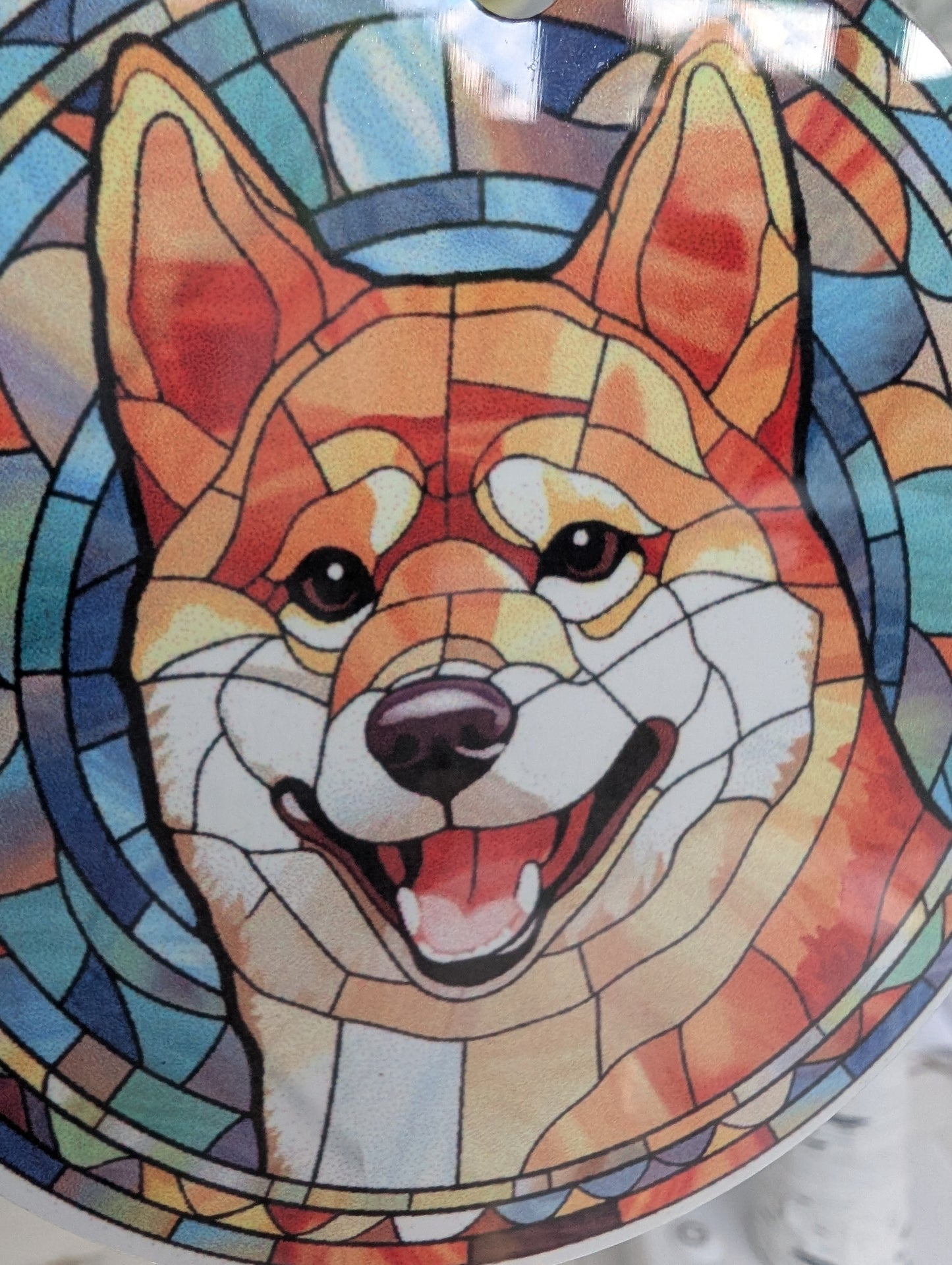 ultra close up of shiba inu design on hanging ornament