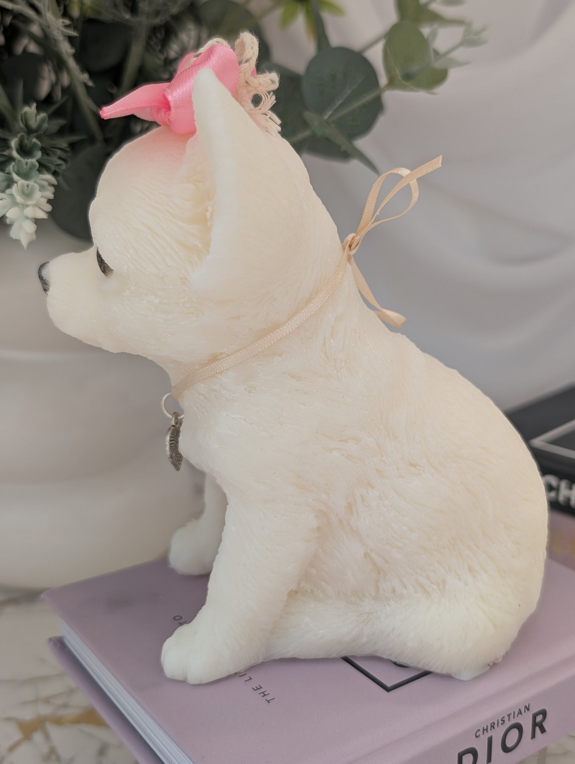 Left-side profile of handcrafted Chihuahua candle with detailed fur texture, perked ears, and visible charm accents