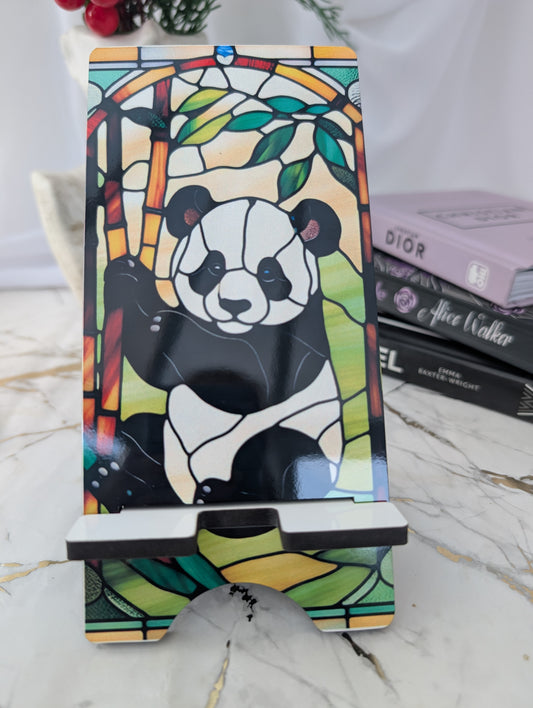 Mobile Phone stand with panda design in stained glass style on a marble surface