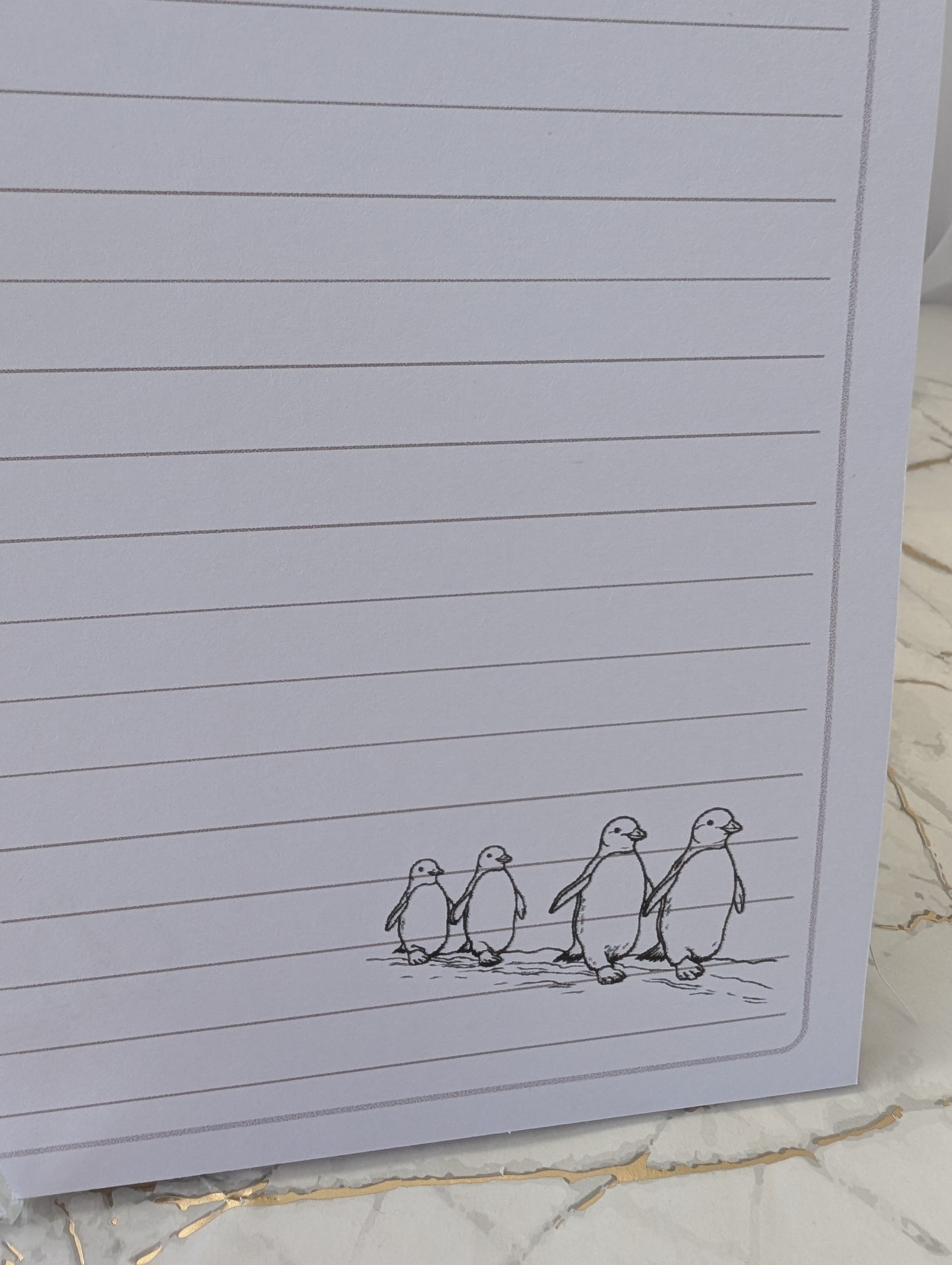 Penguin notebook inside pages view of penguins illustration on each page