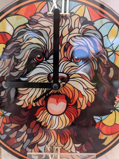 close up image of Portuguese Water Dog stained glass style wall clock.  20cm diameter, round multicolour with black hands and gold Roman numerals