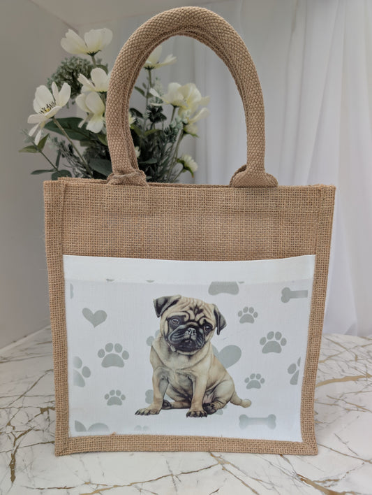 Eco friendly jute tote bag with front pocket, printed with pug against paw, heart and bone background