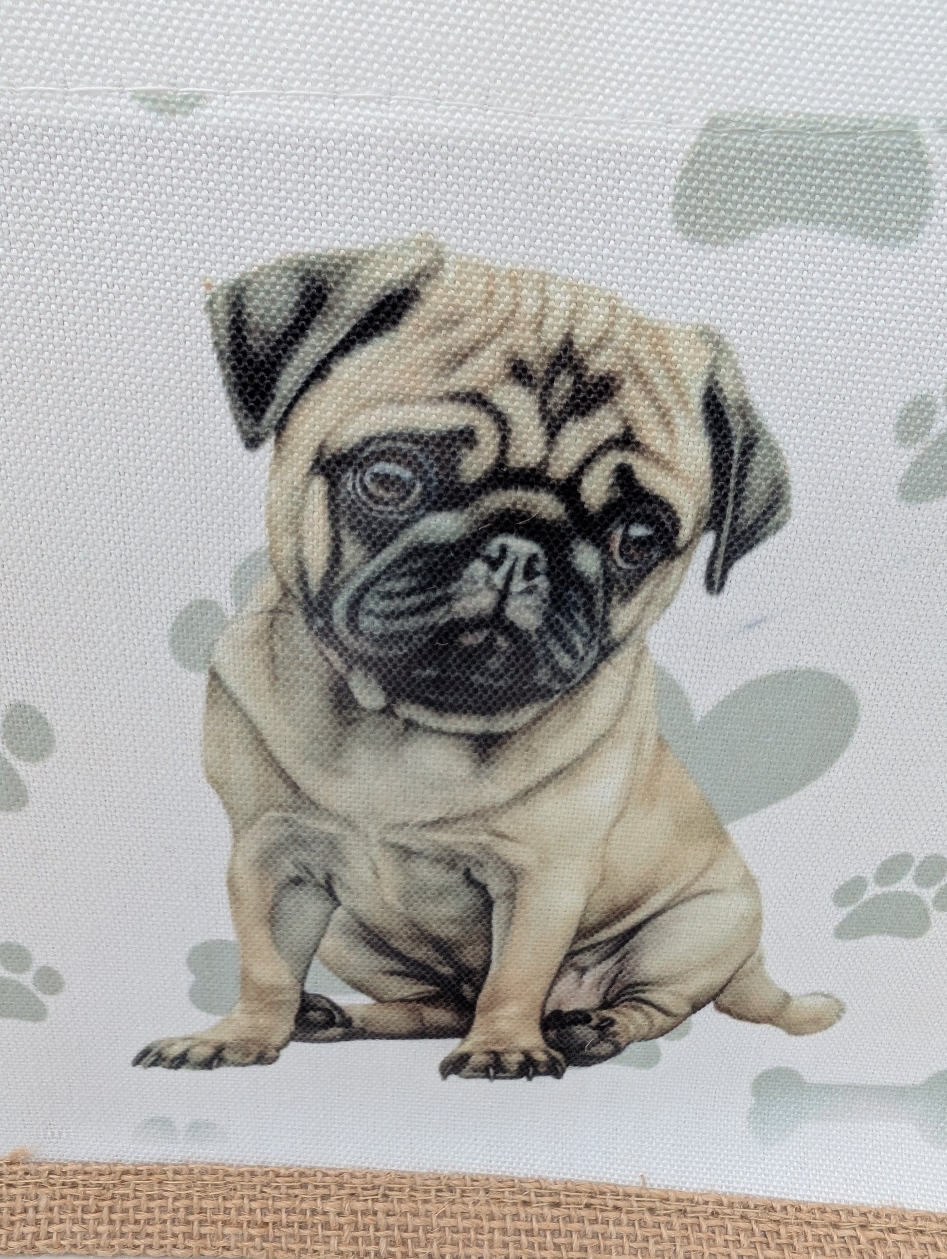 Close up of pug image on the Paws and Glow eco jute tote bag