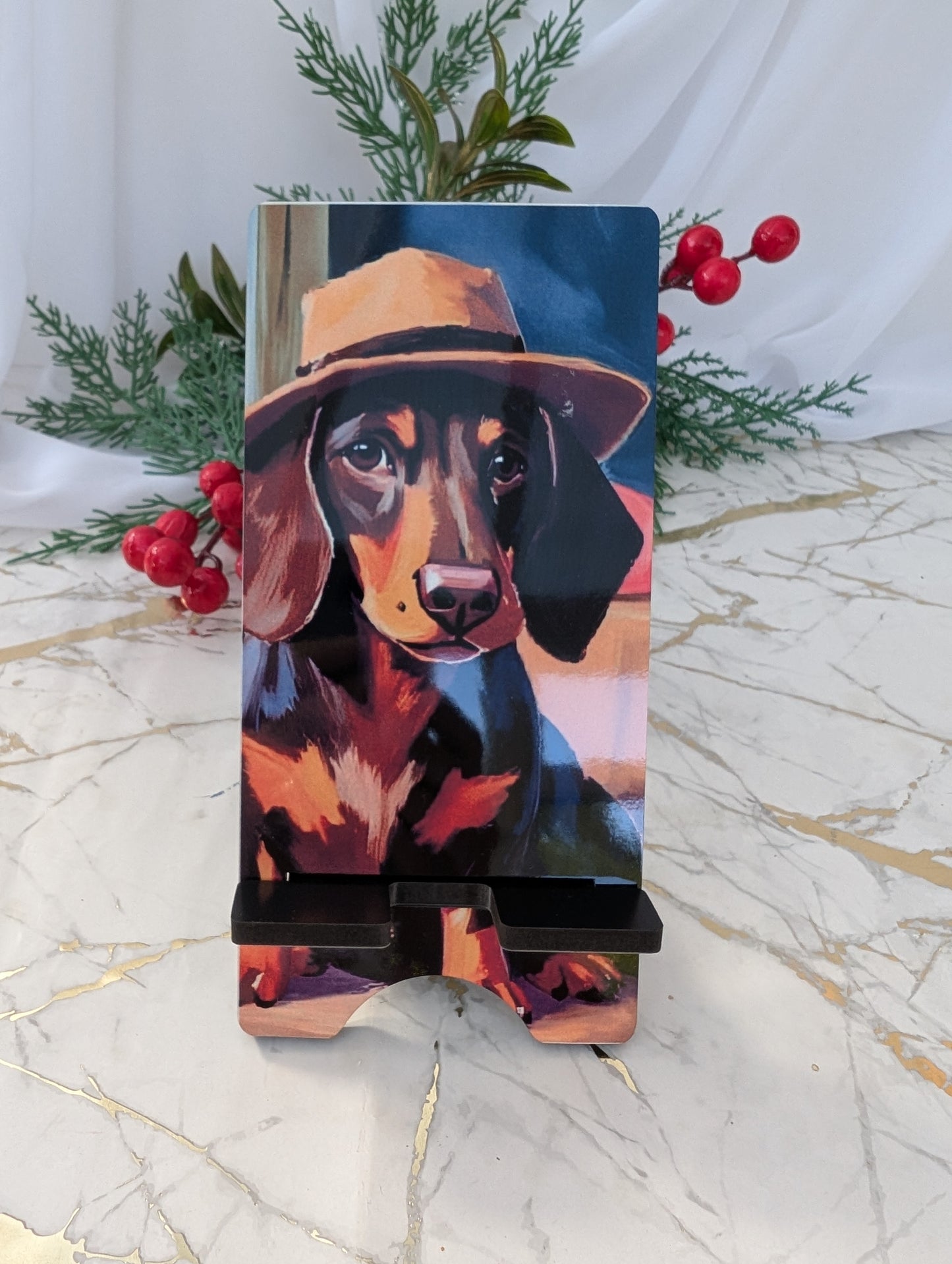 Phone stand with a dachshund wearing a hat on a decorative background