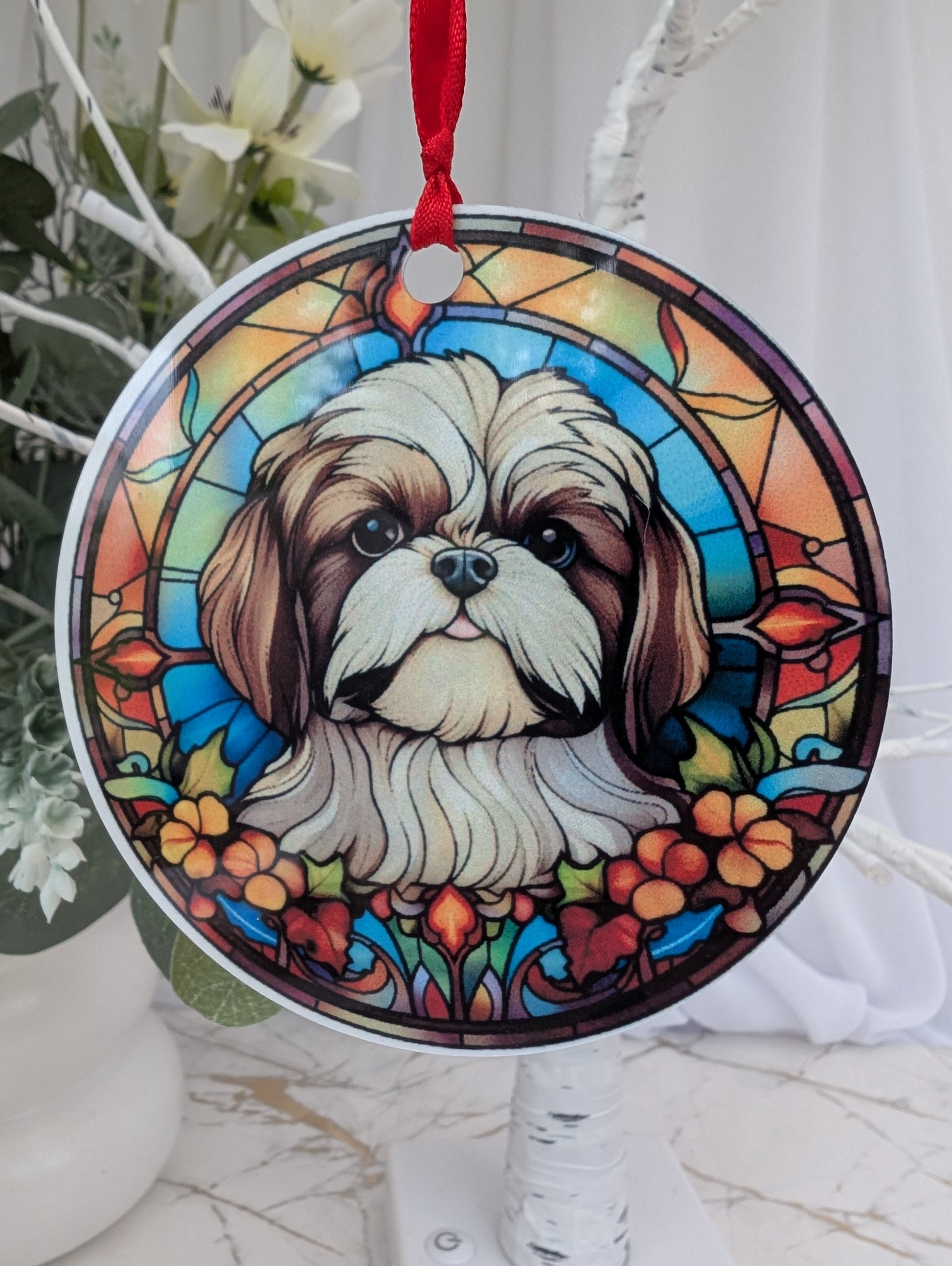 close up of 9cm round aluminium stained glass style schih-tzu hanging ornament