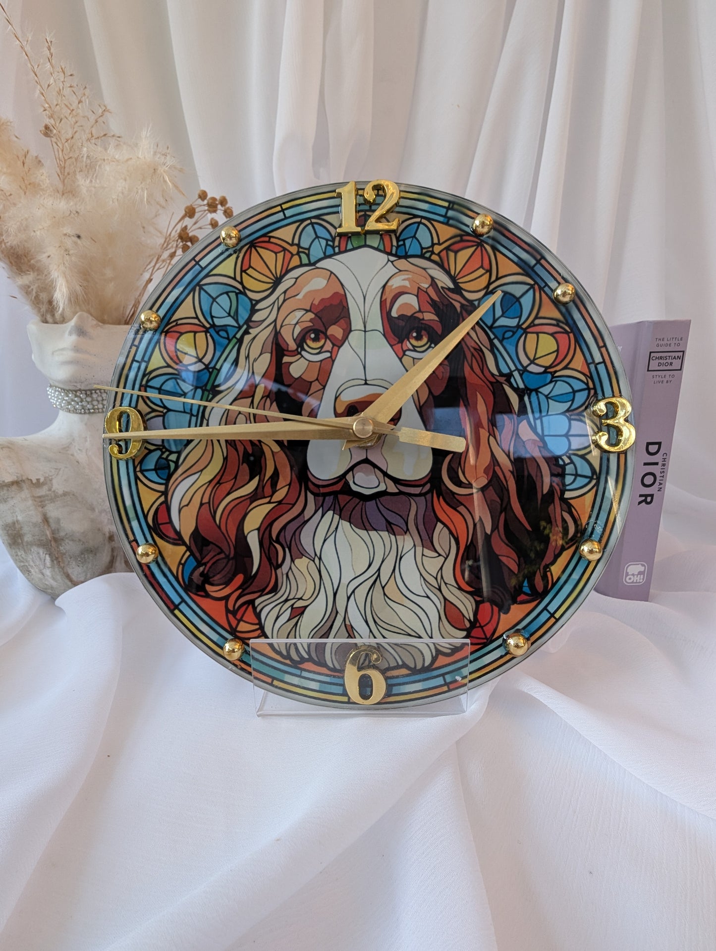 Springer spaniel Colorful clock in a stained glass design on a white surface