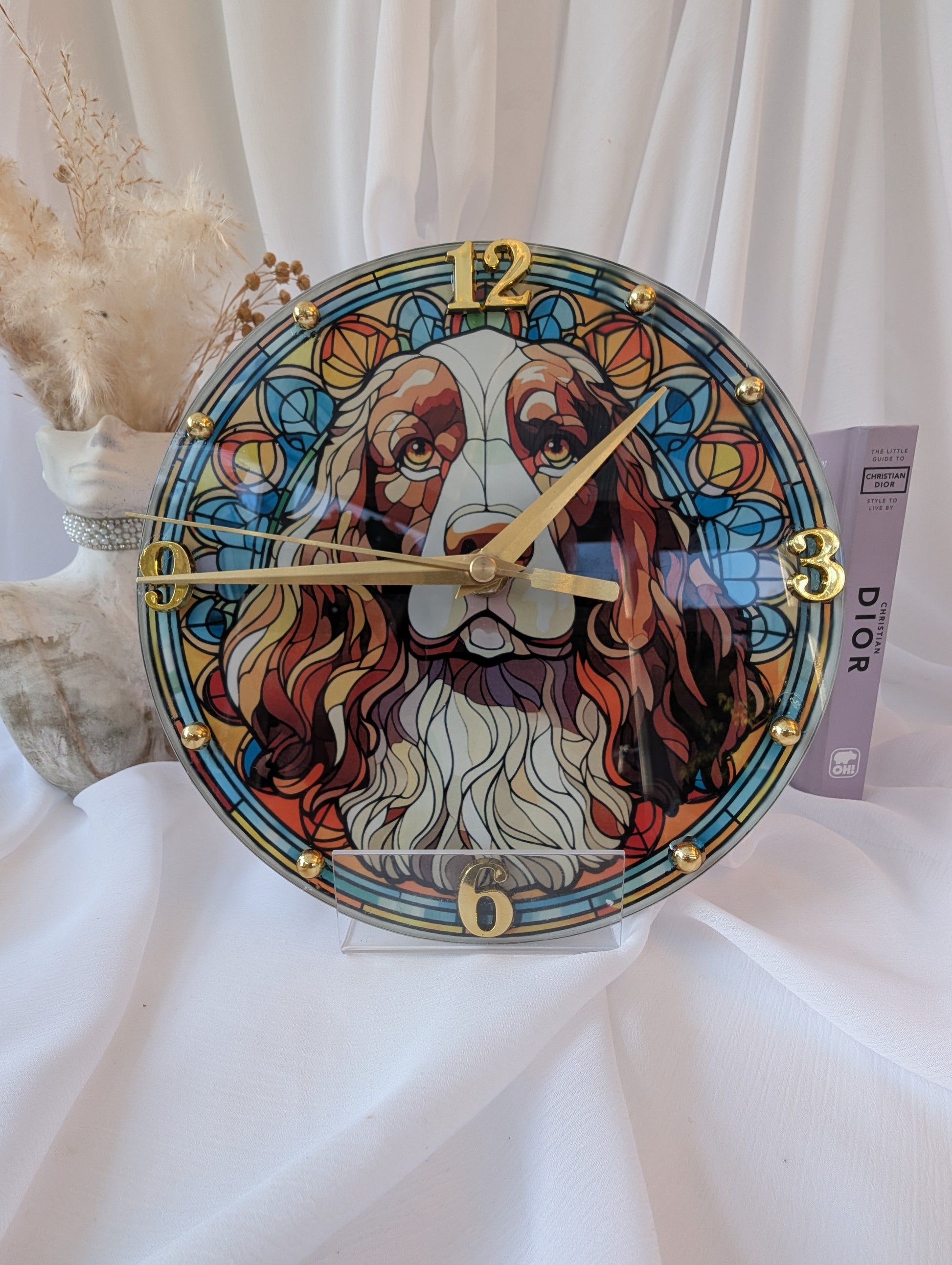 Springer spaniel Colorful clock in a stained glass design on a white surface