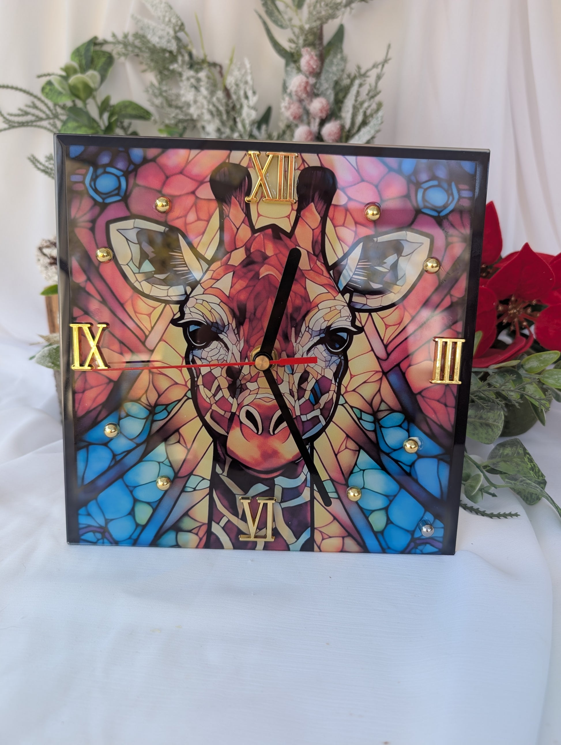 Giraffe lover Gift.  Colorful giraffe clock with decorative elements on a white background