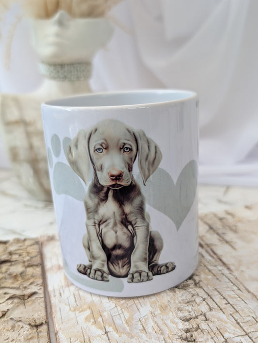 White Ceramic Weimaraner Dog Puppy mug with background of soft grey hear, paw and bone print