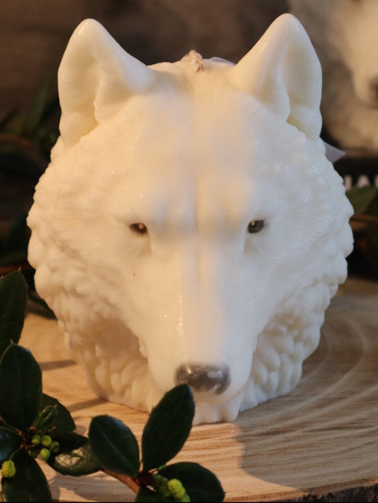 Front view of wolf head candle
