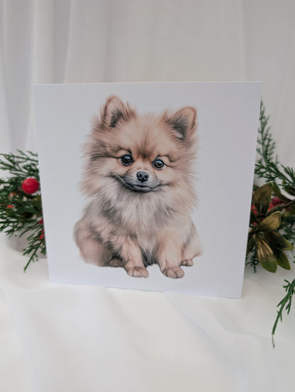 6 x 6 inches white linen effect greeting card printed with watercolour style image of a cute Pomeranian.