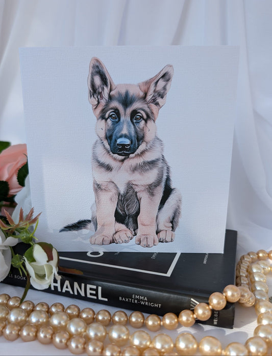 White 300gsm linen effect  card printed with a watercolour style image of a German Shepherd dog puppy 